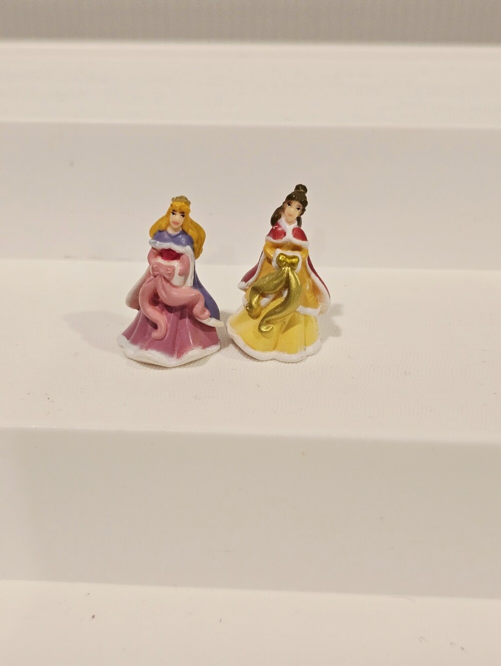 Disney Collector Pack Park Series Micro Holiday Belle and Cinderella Figure Set